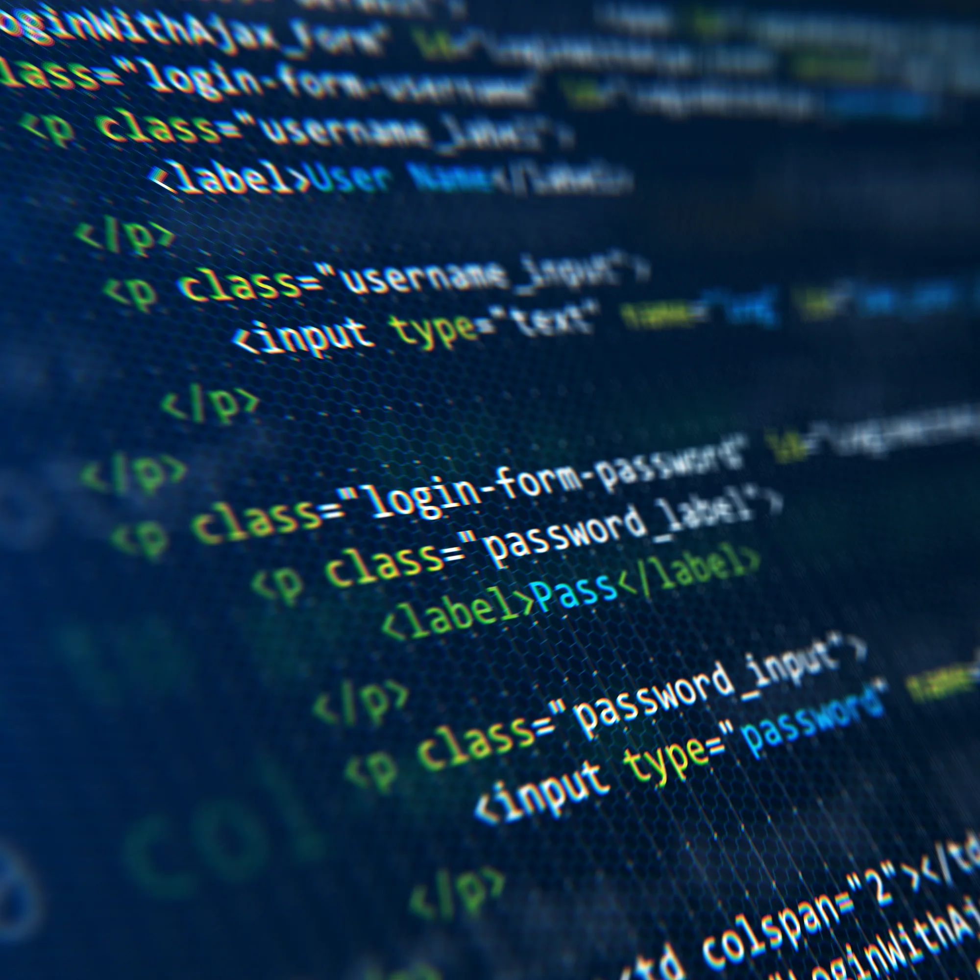 Abstract view of a monitor displaying lines of bright, colorful HTML code for a user login form, emphasizing digital technology and web development.